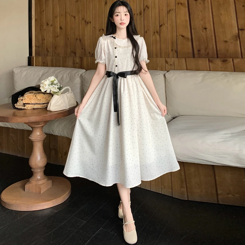 甜美可爱白色波点长裙女2025初高中学生绑带不对称娃娃领连衣裙夏