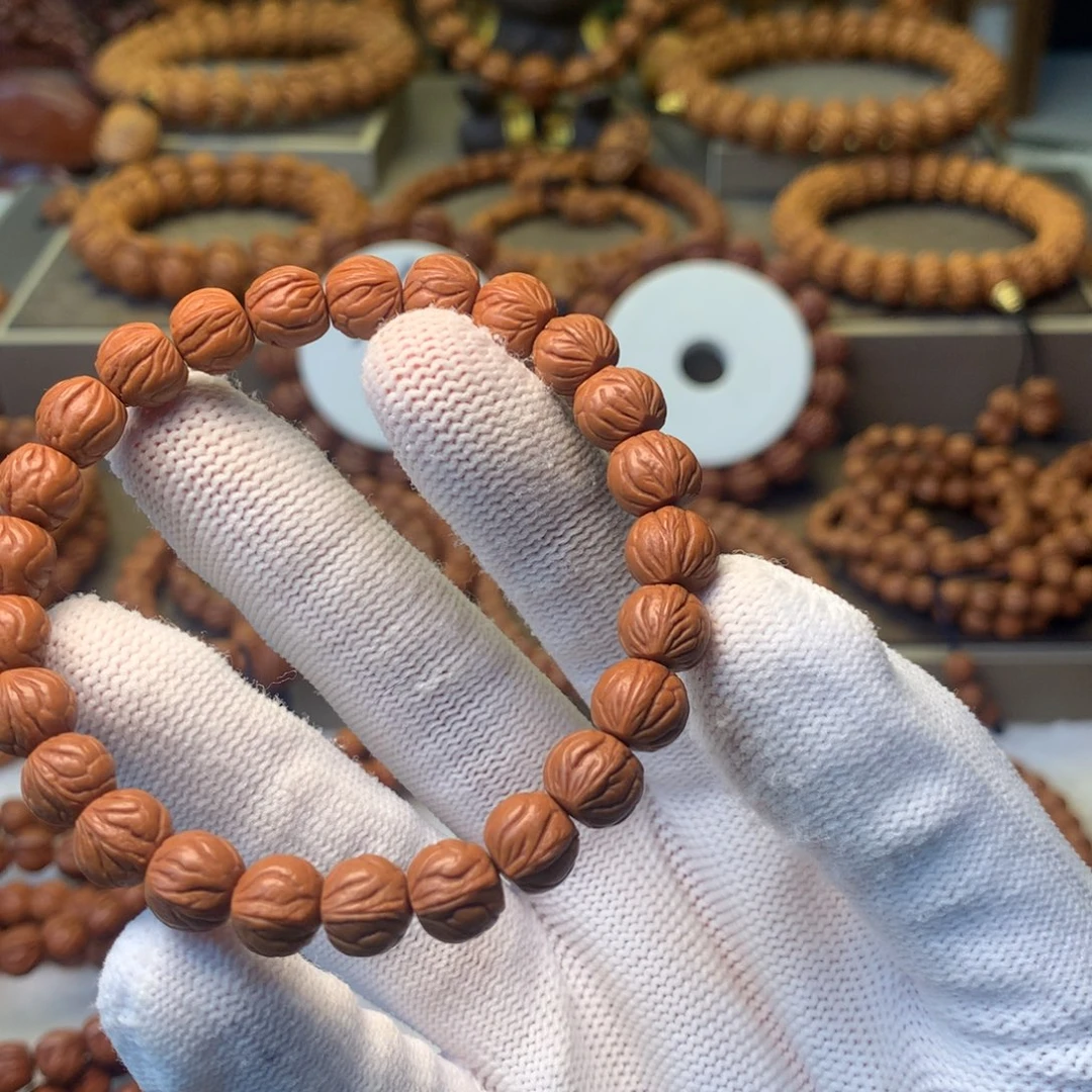 Y***x桃核手串秦岭龙纹