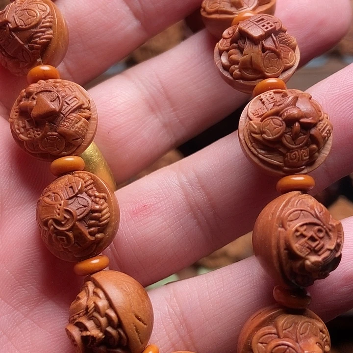 龙纹桃核锦灰堆手串