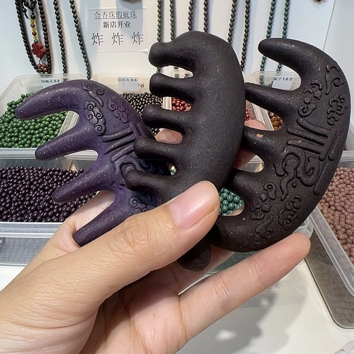 泥塑紫气东来串色梳子一把随机