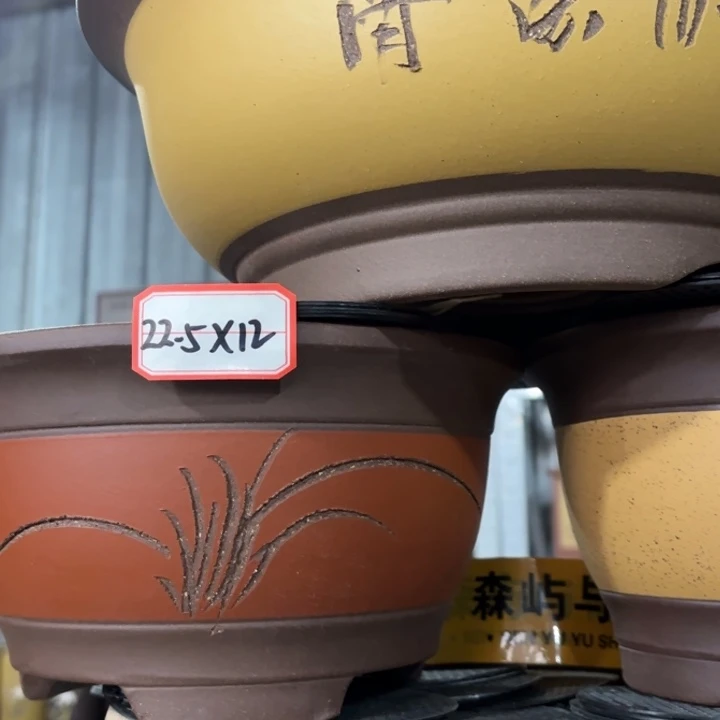 紫砂花盆      100-6。  22.5