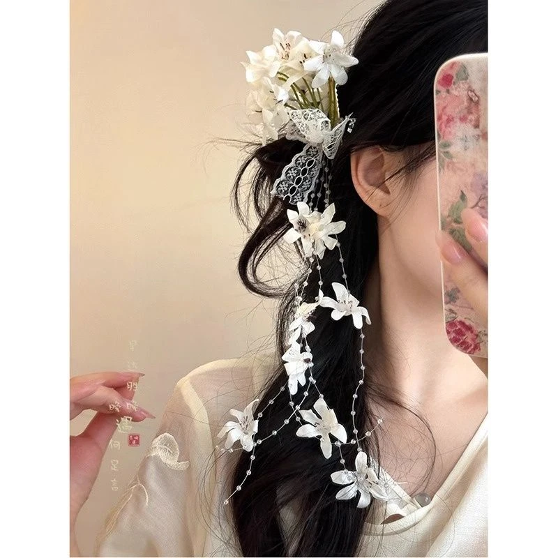 新中式古风仿真铃兰花朵发夹女森系氛围感流苏侧边夹新娘盘头发饰