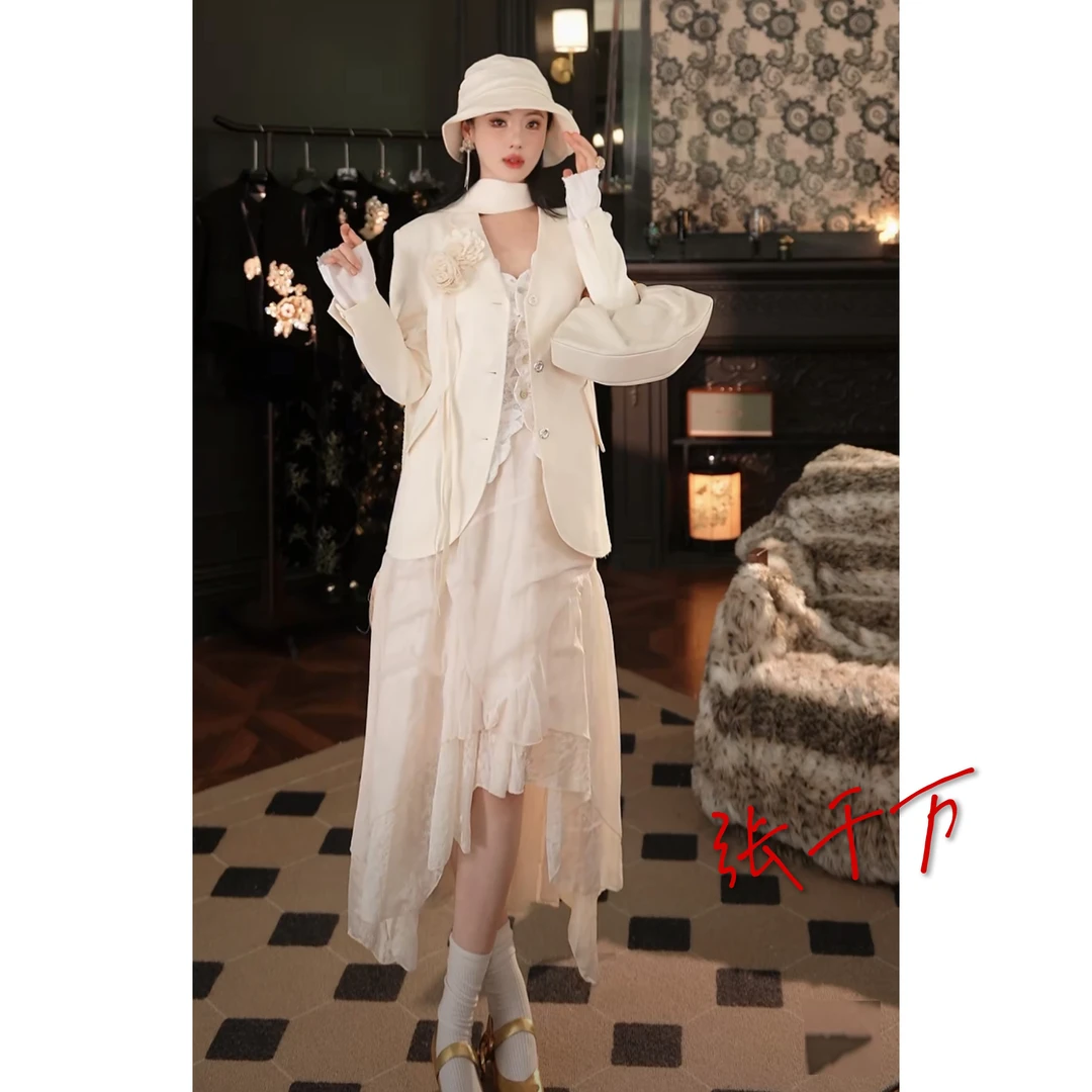 「夜曲」TAM TUAS 多重拼接不规则下摆提花蕾丝系带半身裙