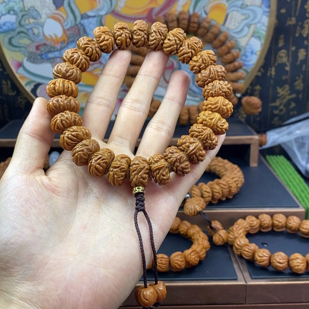 桃核手串尤**尼龙纹桃核苍龙