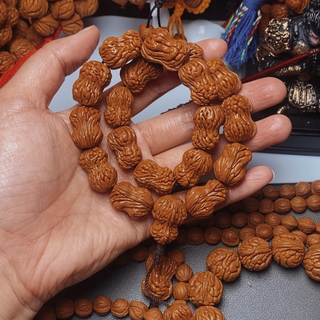 桃核吊坠桃枭手持1