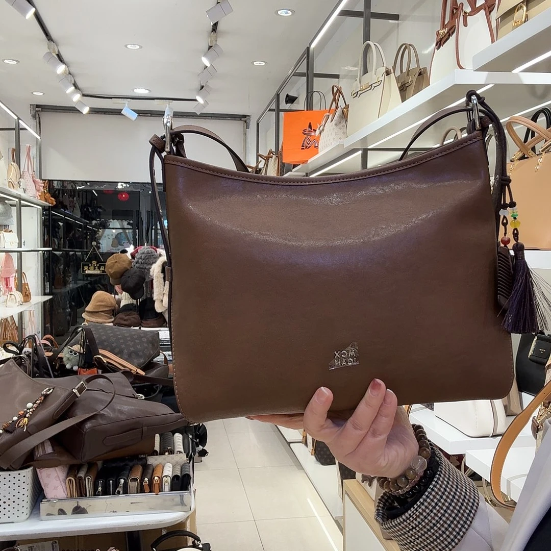 牛剖层皮革稻草人女包斜挎包