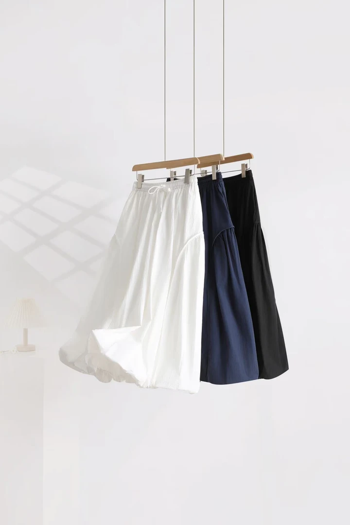 春季新款气质宽松花苞半身裙百搭长裙松紧腰韩版纯色高腰