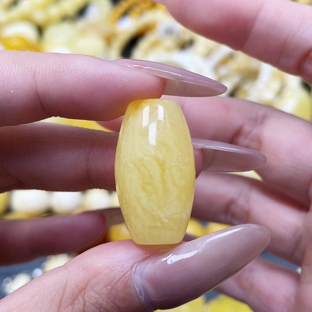 琥珀未镶嵌裸石15.6*27.3mm虎皮桶珠 瑕
