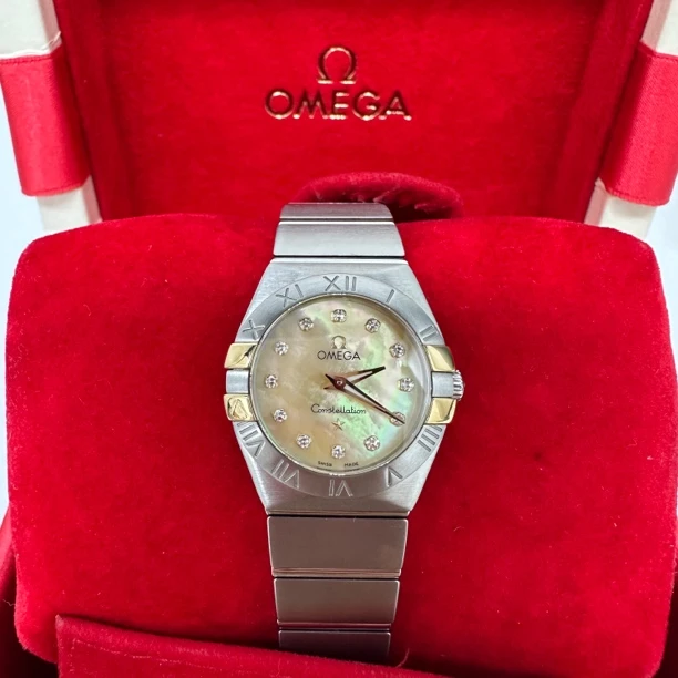 99新 Omega/欧米茄 99新欧米茄 石英/黄贝母钻刻/18k金耳朵/24