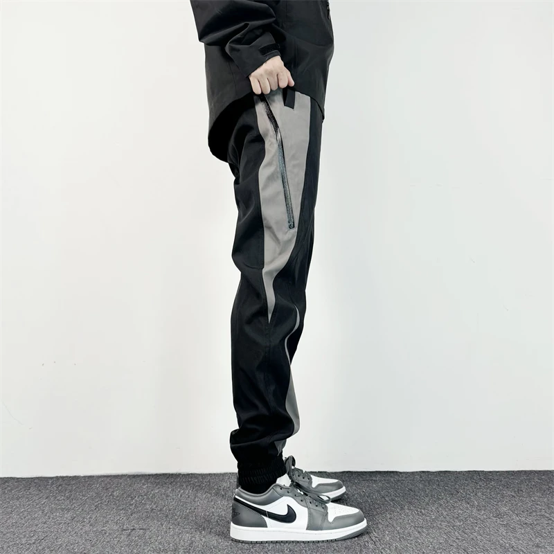 soldixz 2024防泼水机能拼接结构侧拉链拼色户外束脚裤男拼接尖尖