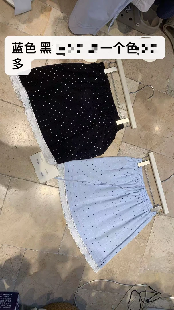 下摆蕾丝边波点半身裙