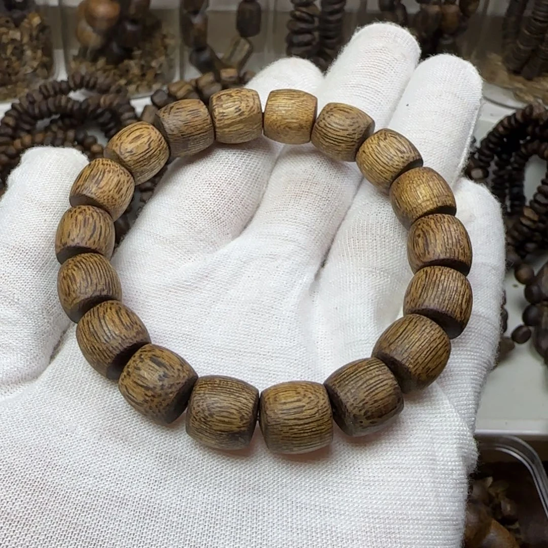 蝴***_沉香手串绿奇楠直纹鼓珠1.1规格