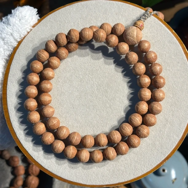 精选尼泊尔凤眼菩提54颗手持手串正圆玉化皮黄金眼