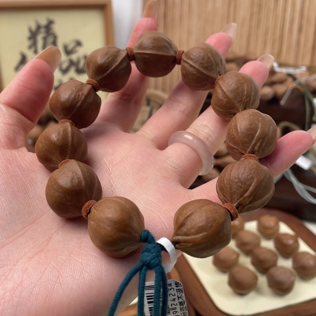 徐***庆手串/手链橄榄核21.5 23梅林铁核
