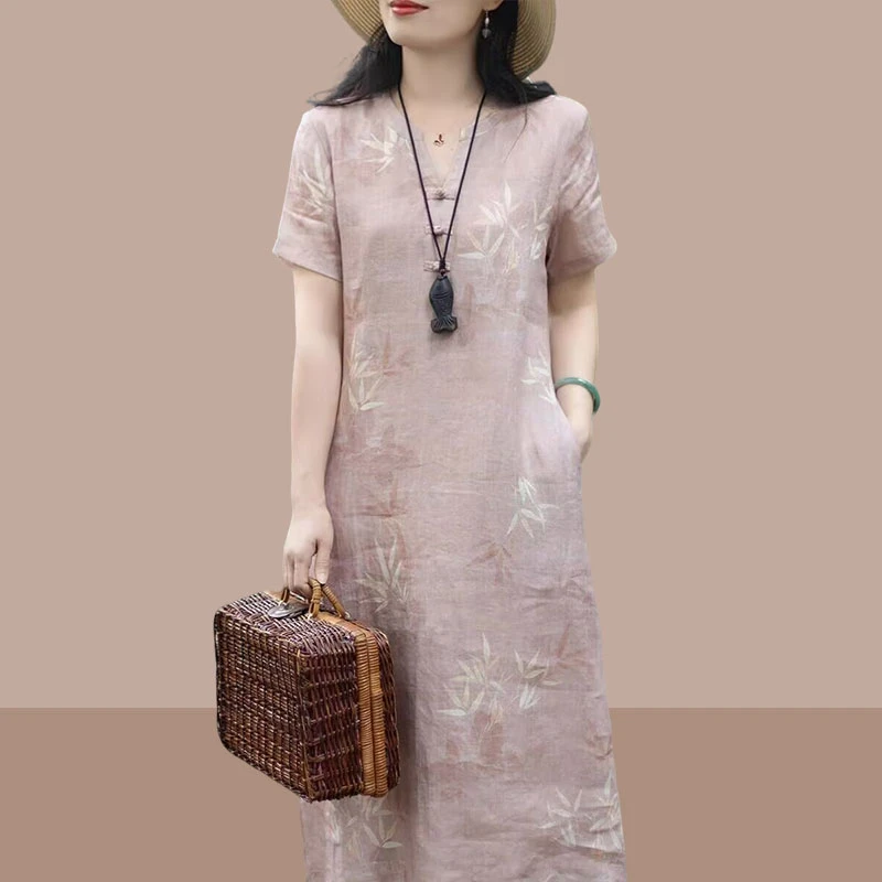 夏季新款温柔雅致竹叶印花苎麻V领盘扣短袖松弛显瘦新高贵连衣裙
