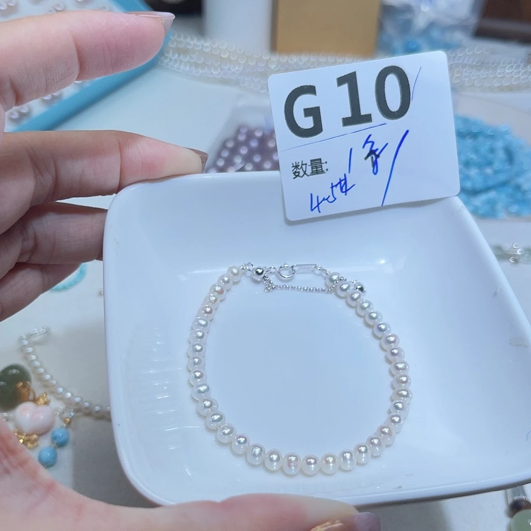 银S925镶嵌珠宝奇石淡水珍珠F10。