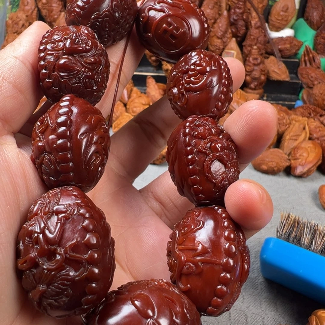 蜗***牛橄榄核手串/手链核雕