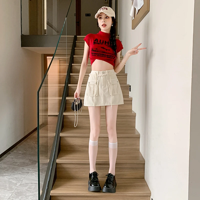 夏季新款时尚百搭高腰显瘦A字杏色抽绳毛边牛仔短裙女