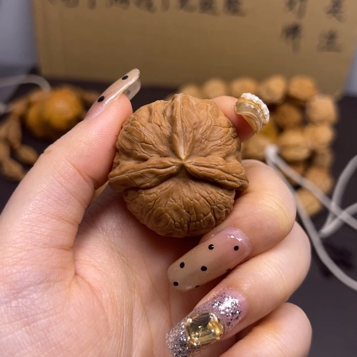 ****y桃核吊坠元宝单只异型有瑕有黄