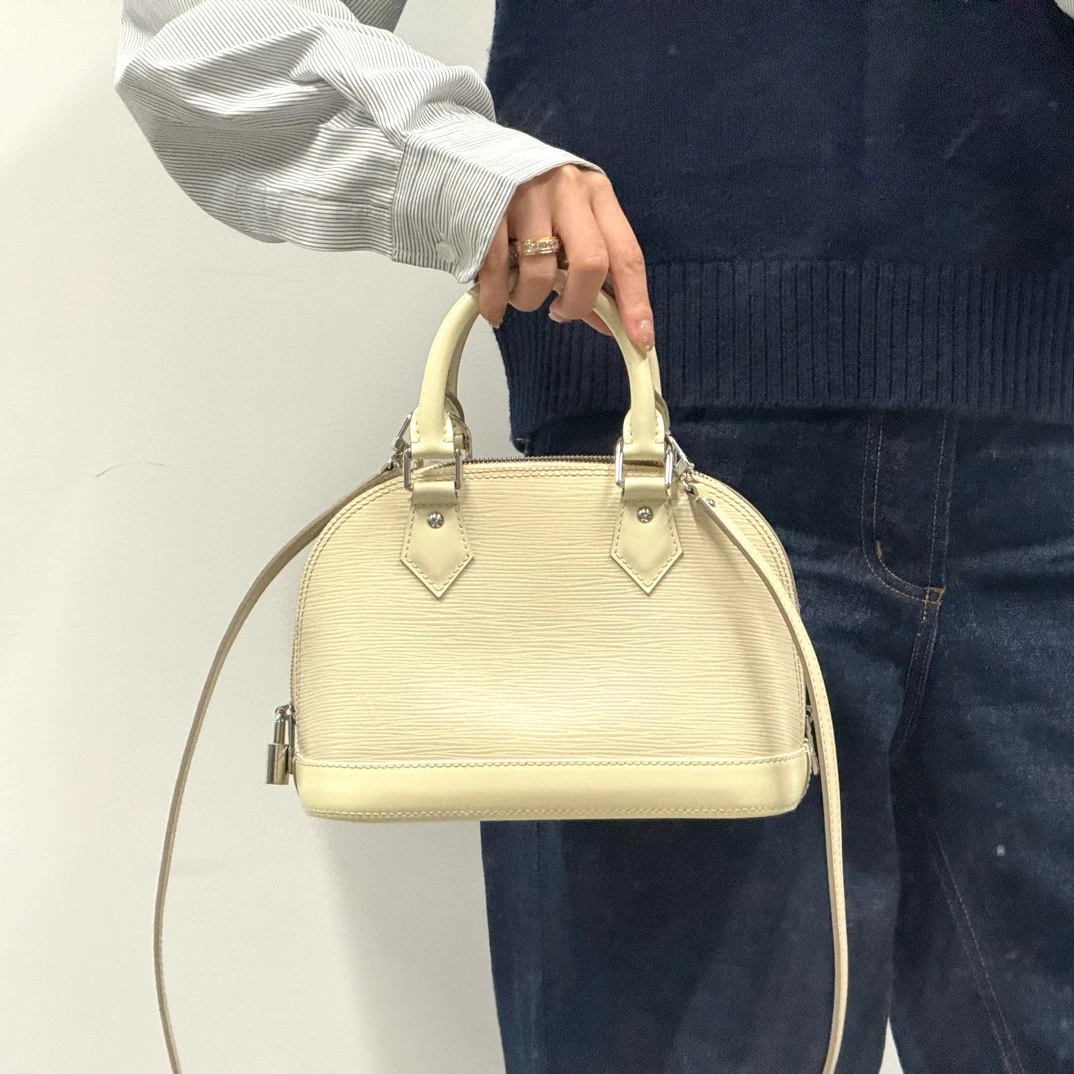 95新 LouisVuitton/路易威登 lv奶油白水波纹手提斜挎包