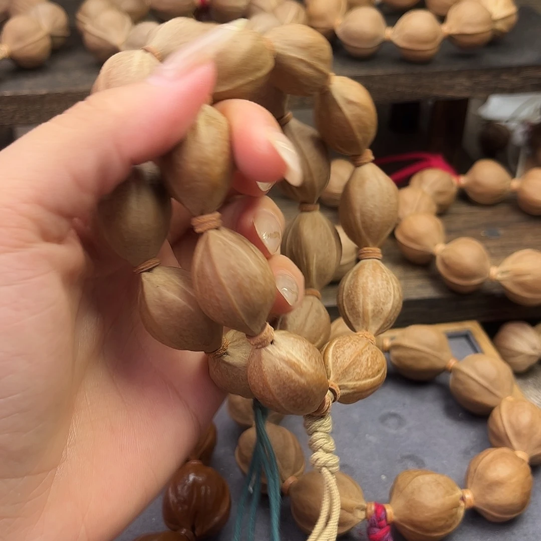 顾***选橄榄核手串/手链梅林