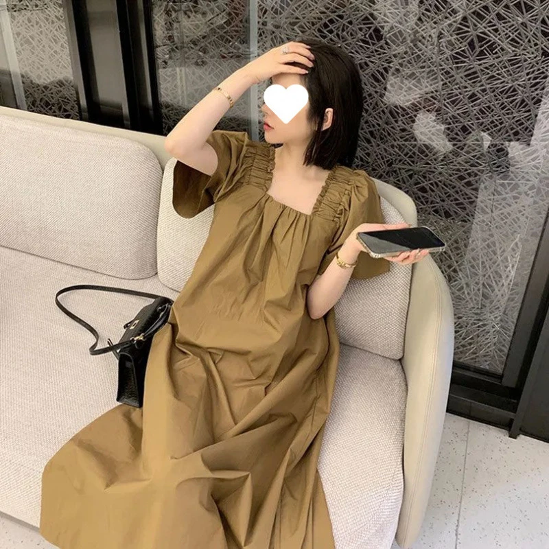 方领连衣裙女夏季2025新款度假风木耳边系带中长款显瘦法式宽松收