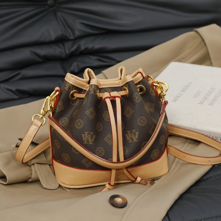 印花单肩耐磨斜挎包棕色圆筒经典斜跨复古饺子包轻奢