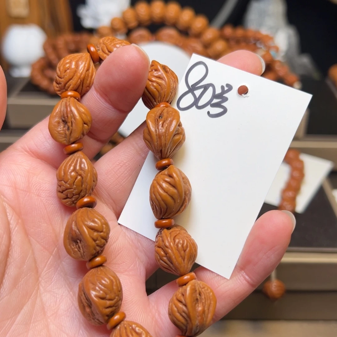 文***哥桃核吊坠秦岭龙纹桃核13生命之源