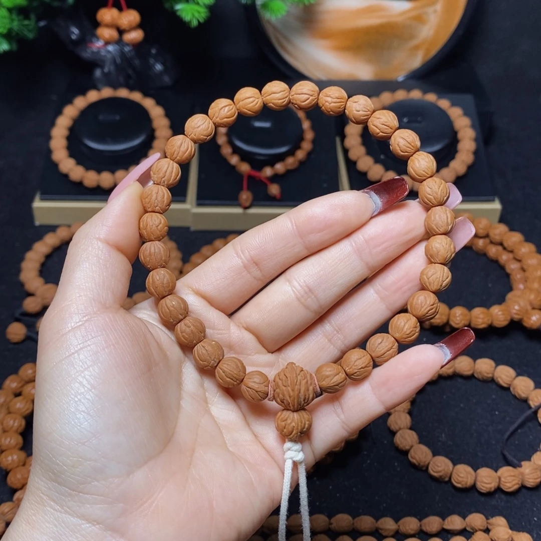 十***贰桃核吊坠秦岭文玩