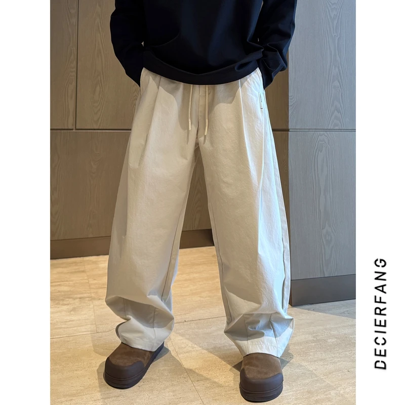 早春美式vibe打褶弯刀裤潮牌简约百搭高级感直筒男士宽松休闲裤