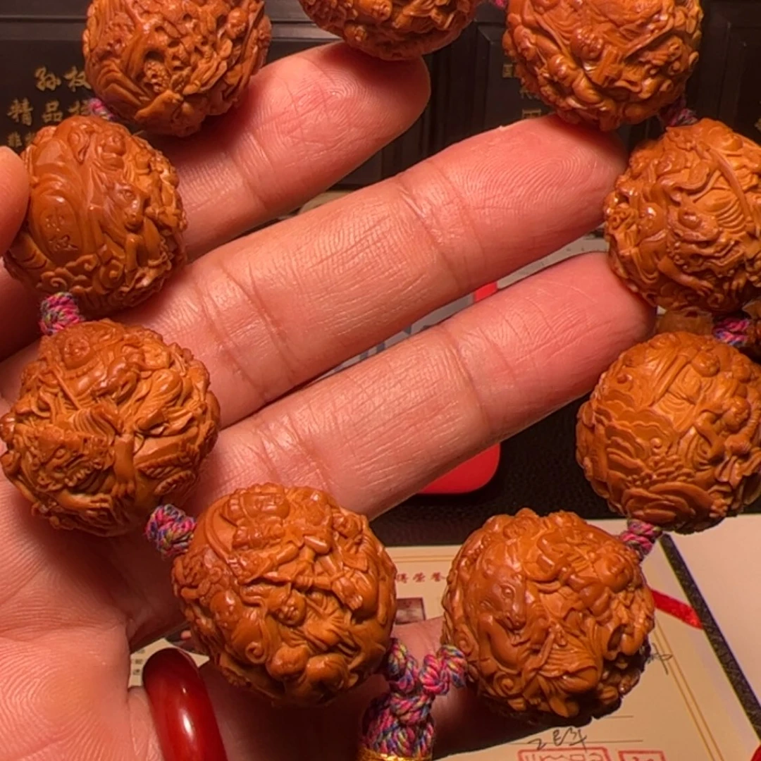 忙***李手串橄榄核万佛朝宗