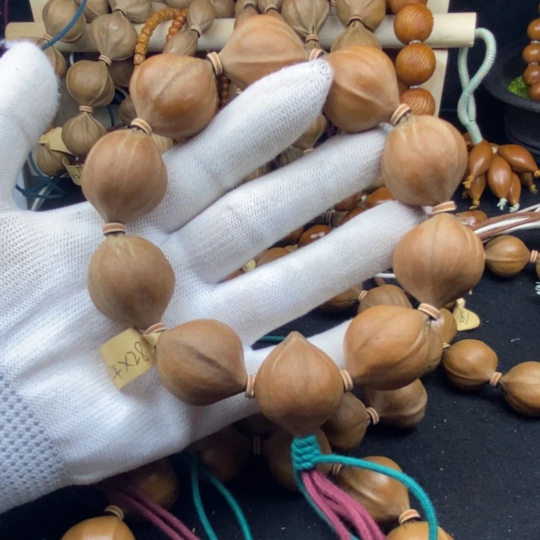 谷***哥橄榄核手串/手链2428三花大蒜头10颗