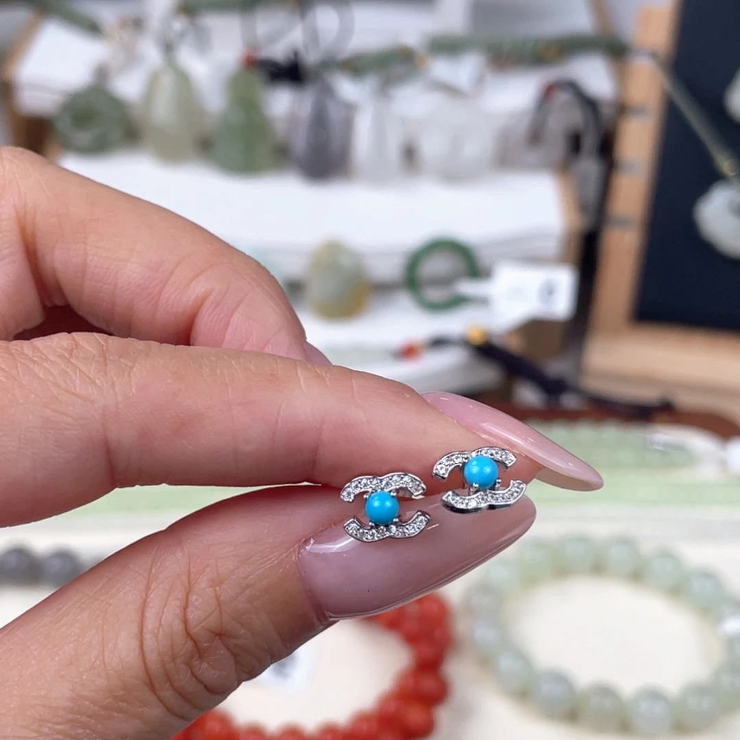 吴***网绿松石银S925镶嵌耳饰