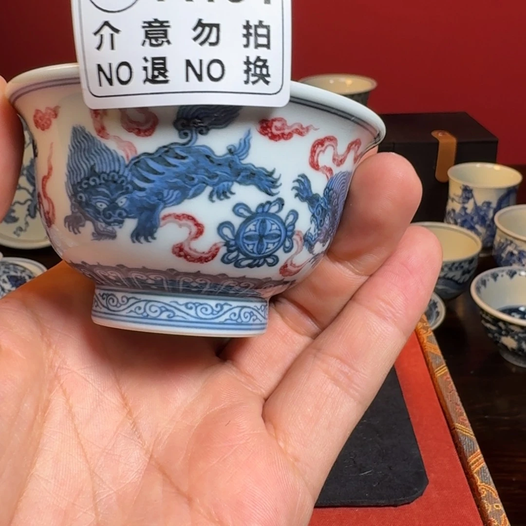 郭***爹摆件柴窑青花釉里红狮子