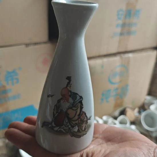 库存微瑕老寿星二两酒壶