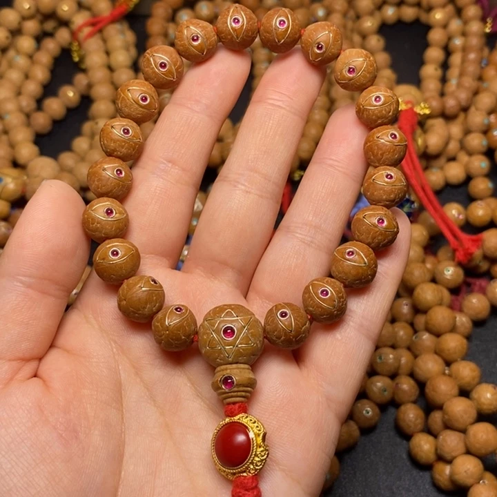 凤眼菩提手串老****店手串12+描眼线