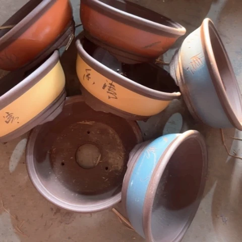 紫砂花盆100-7。  25-10