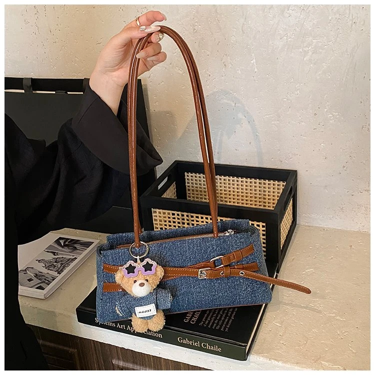 超火小众牛仔布包包女2025新款撞色百搭单肩腋下包通勤手提法棍包