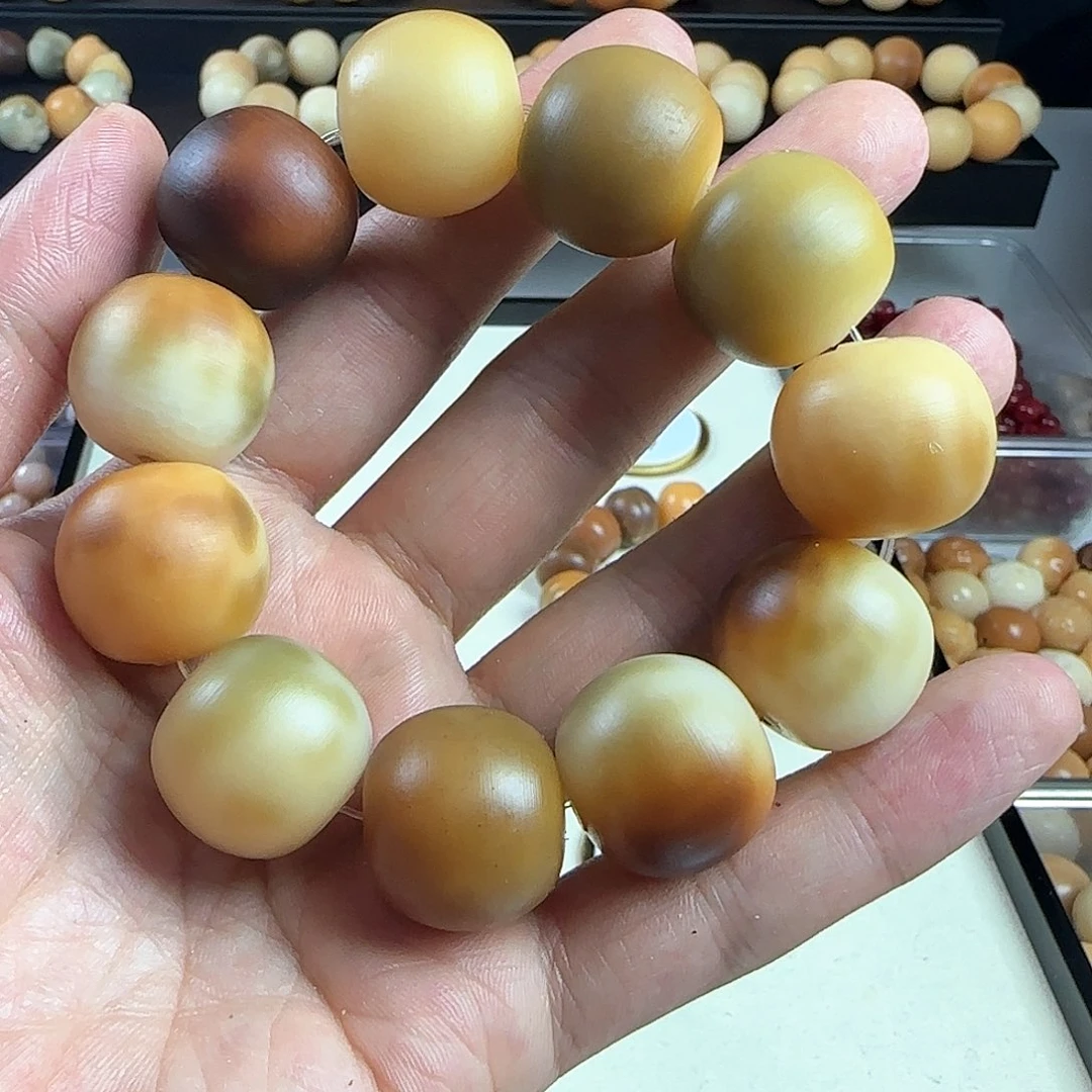 菩提根/象牙果手串爱****卷瑕疵手串一条