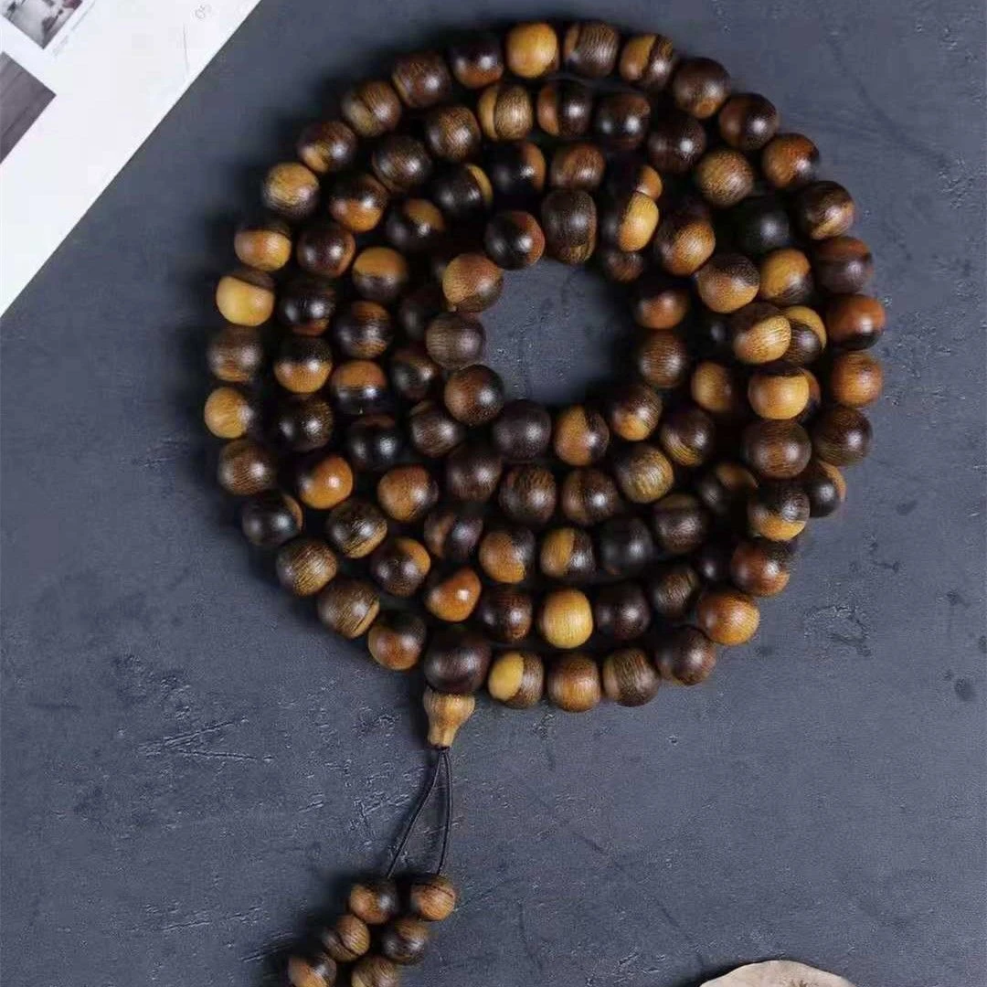 越南富国岛红土棋楠花斑珠0.8*108+沉香碎屑