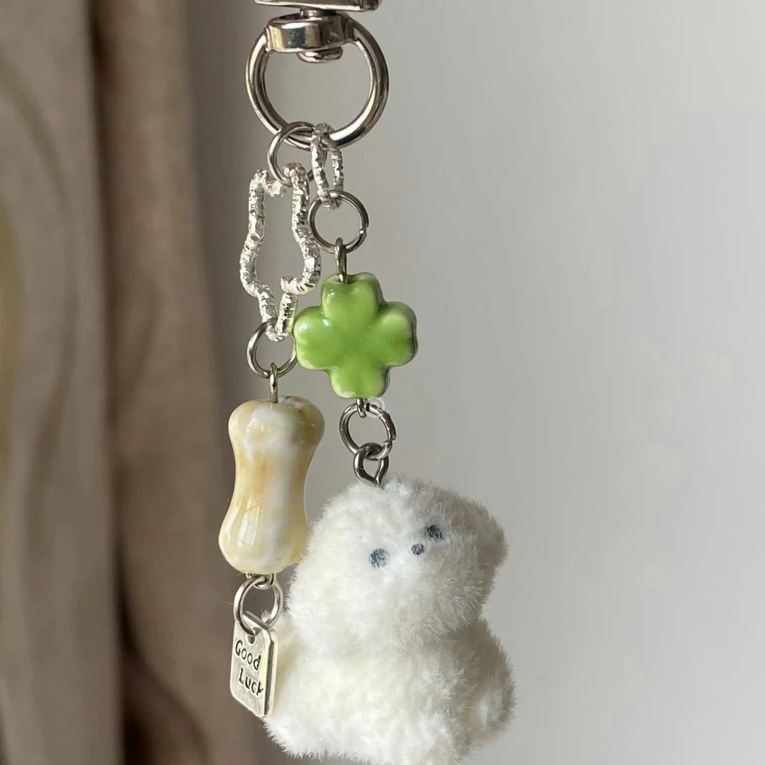 新款小狗手机链挂件可爱骨头ins相机挂绳挂链吊坠女书包钥匙扣