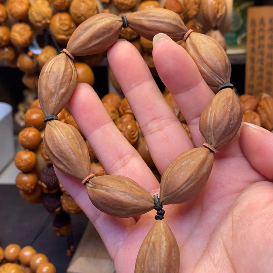 橄榄核手串/手链紫皮四花