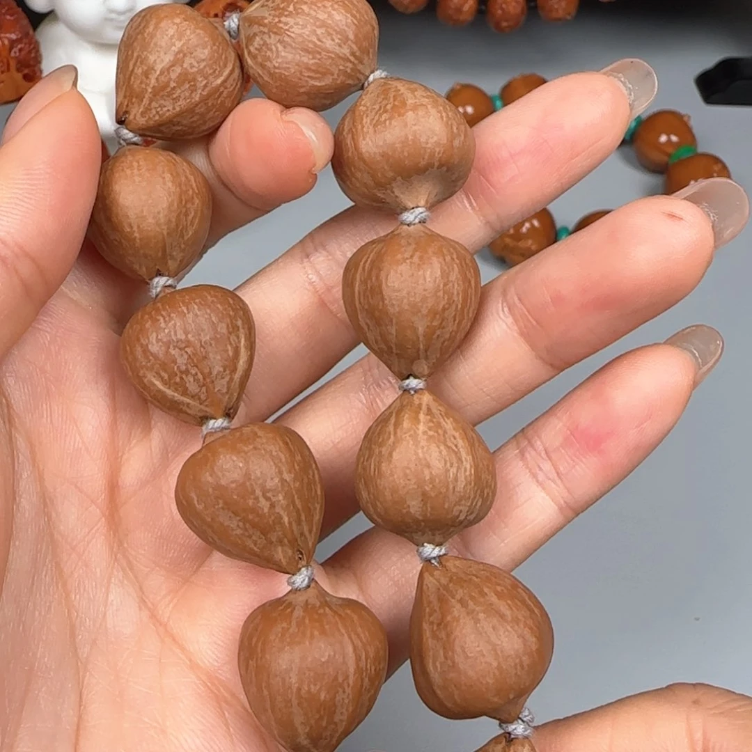 吊坠橄榄核蜜桃臀素核