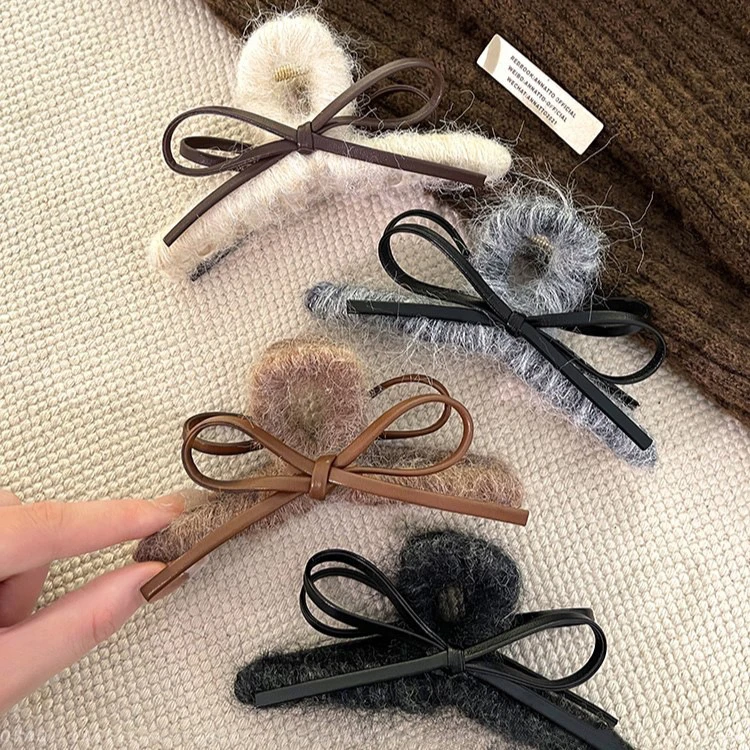 秋冬毛线皮质蝴蝶结抓夹女后脑勺2024新款高级感鲨鱼夹子发夹发饰