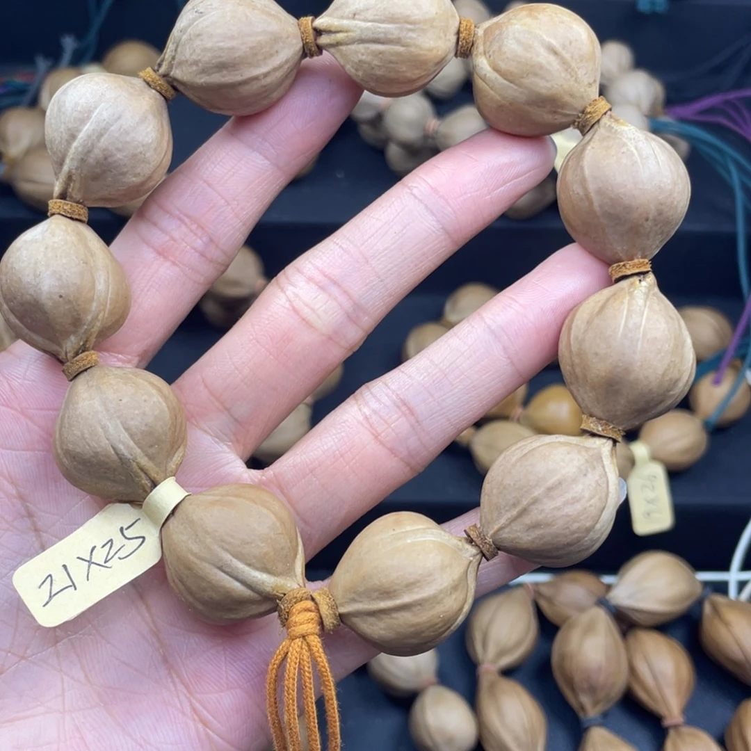鹿***记002橄榄核三花21*25