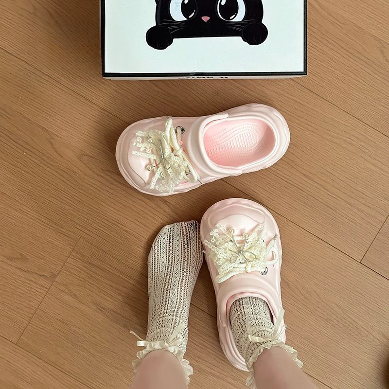 休闲时尚百搭休闲可爱蝴蝶结洞洞鞋2025夏季外穿配裙子软厚底拖鞋