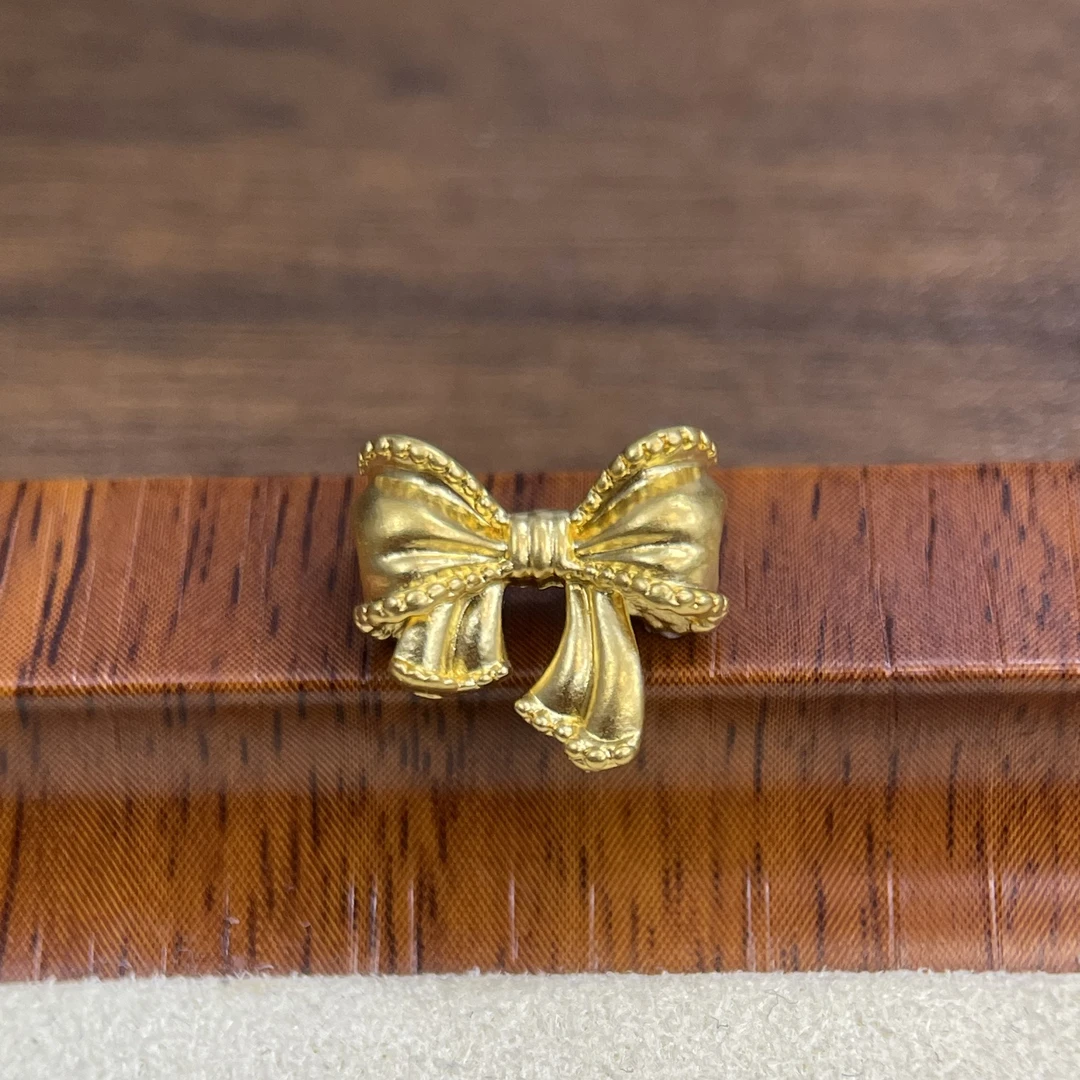 吴芳芳黄金足金999蝴蝶结通孔小DP1660-0280