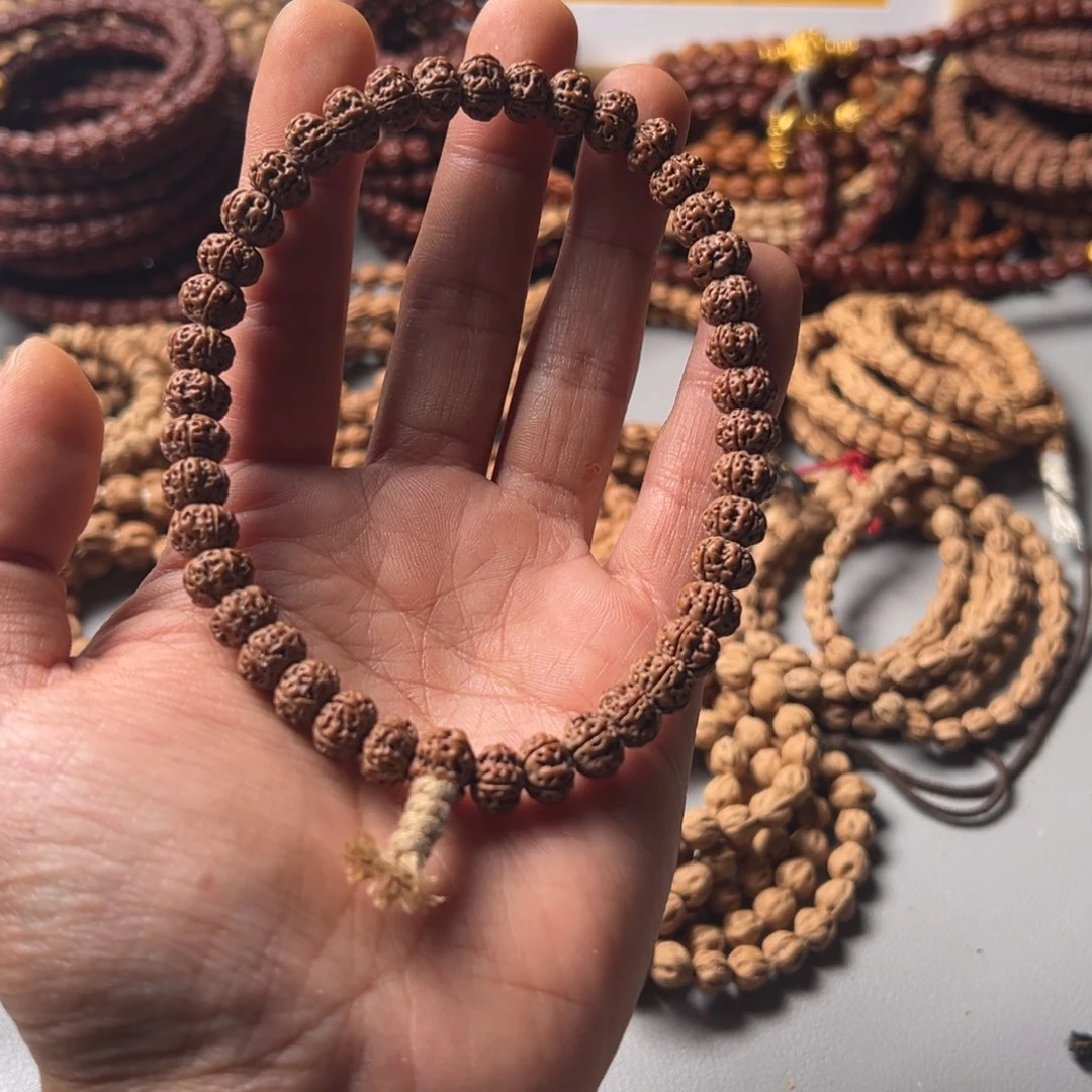 孟****柏香籽/百香籽吊坠