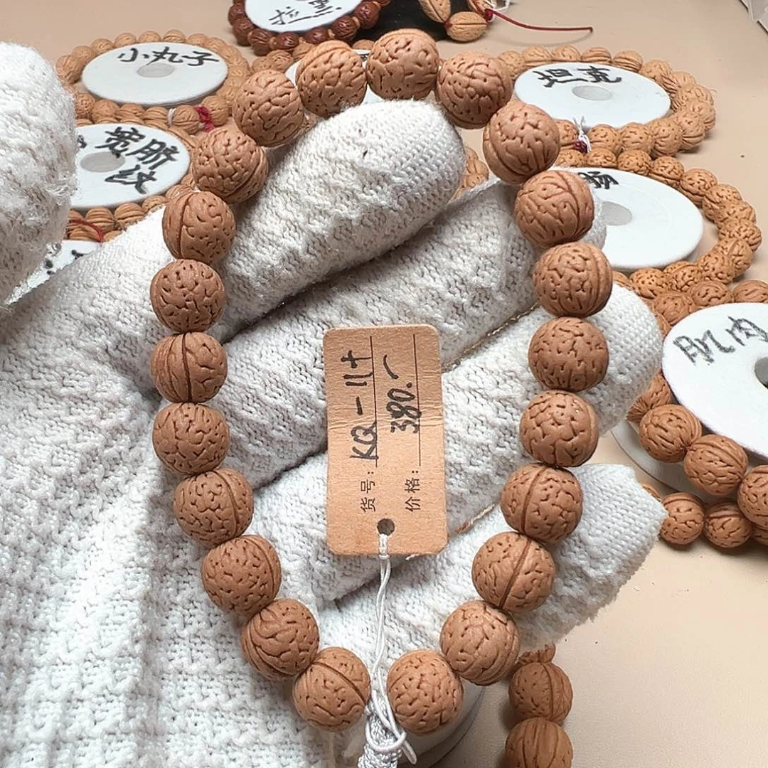 敬***长手串桃核宽脐精品