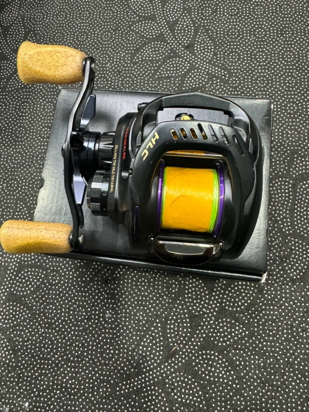 95#路亚水滴轮，子龙1514左7.3轻微痕迹无齿感书盒齐全